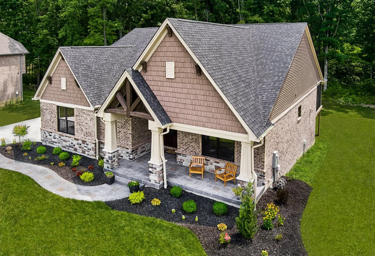 Atlas Pinnacle Pristine Black Shadow shingles on a house