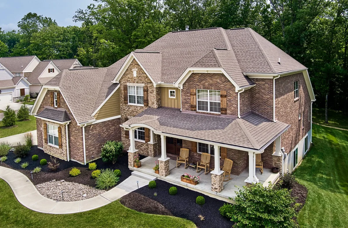 Atlas Pinnacle Pristine Weathered Wood shingles on a house