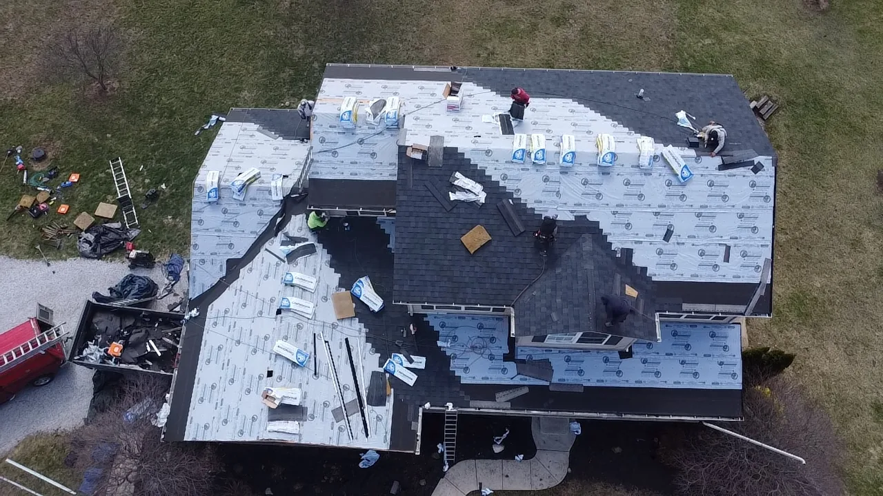 Aerial view of a Sealed Solutions Roofing roof replacement in progress