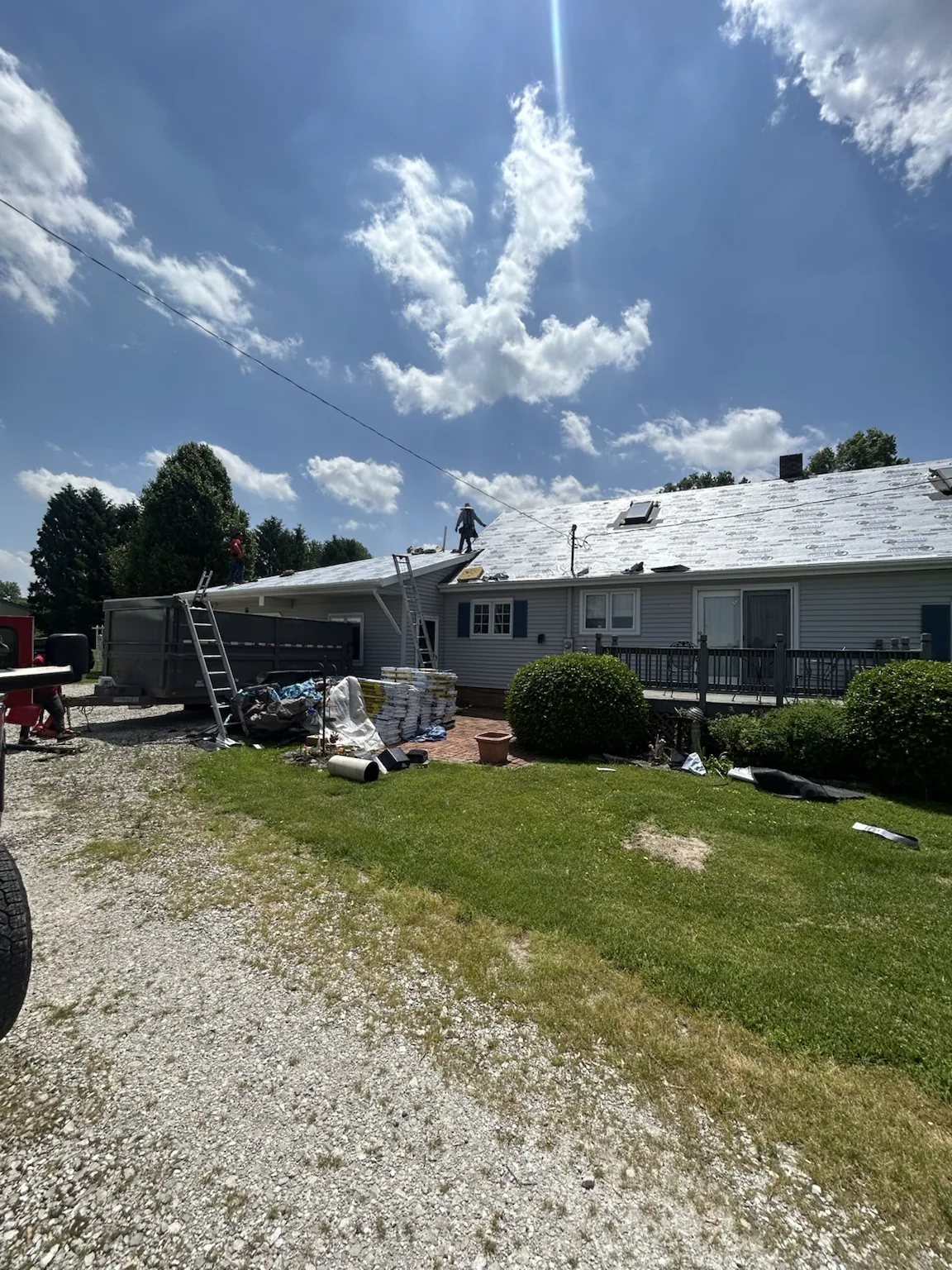 Home exterior during a Sealed Solutions Roofing project