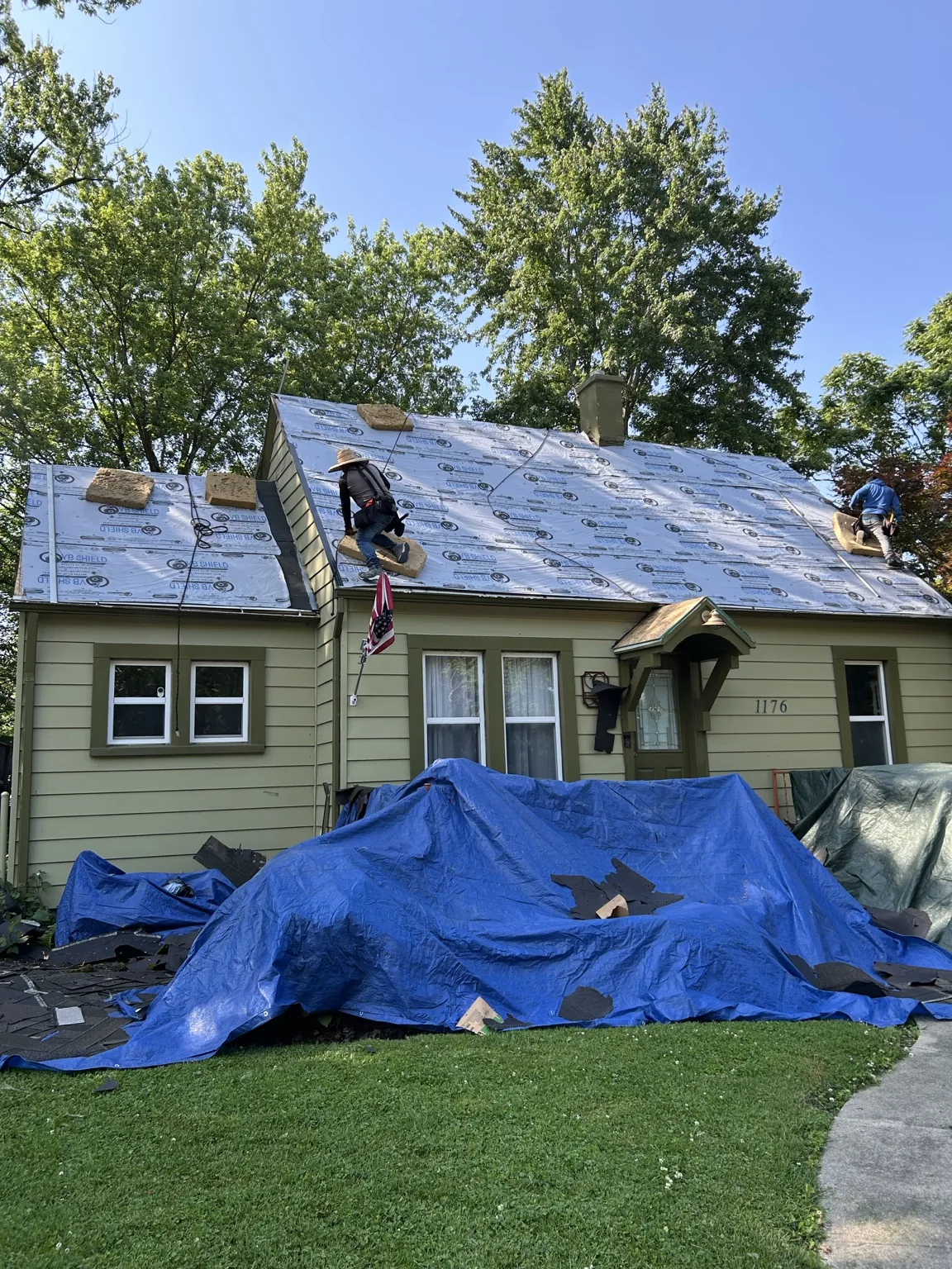 Temporary roof tarp protection during repair work