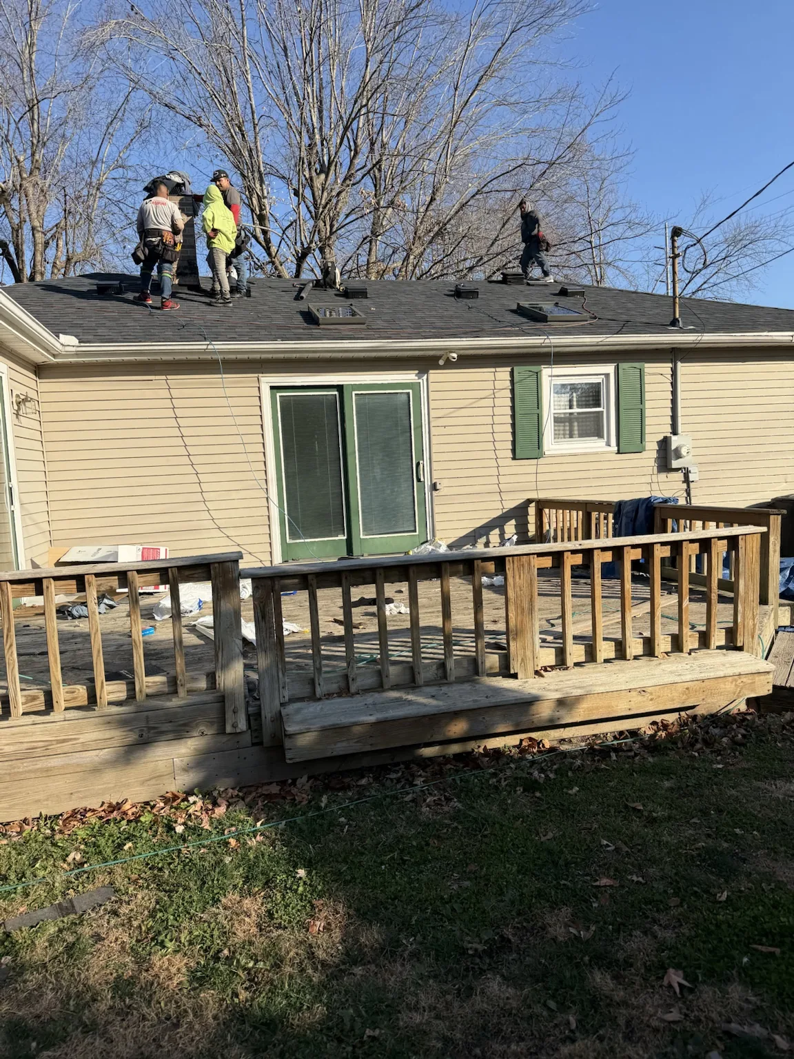 Sealed Solutions Roofing crew working on a residential roof