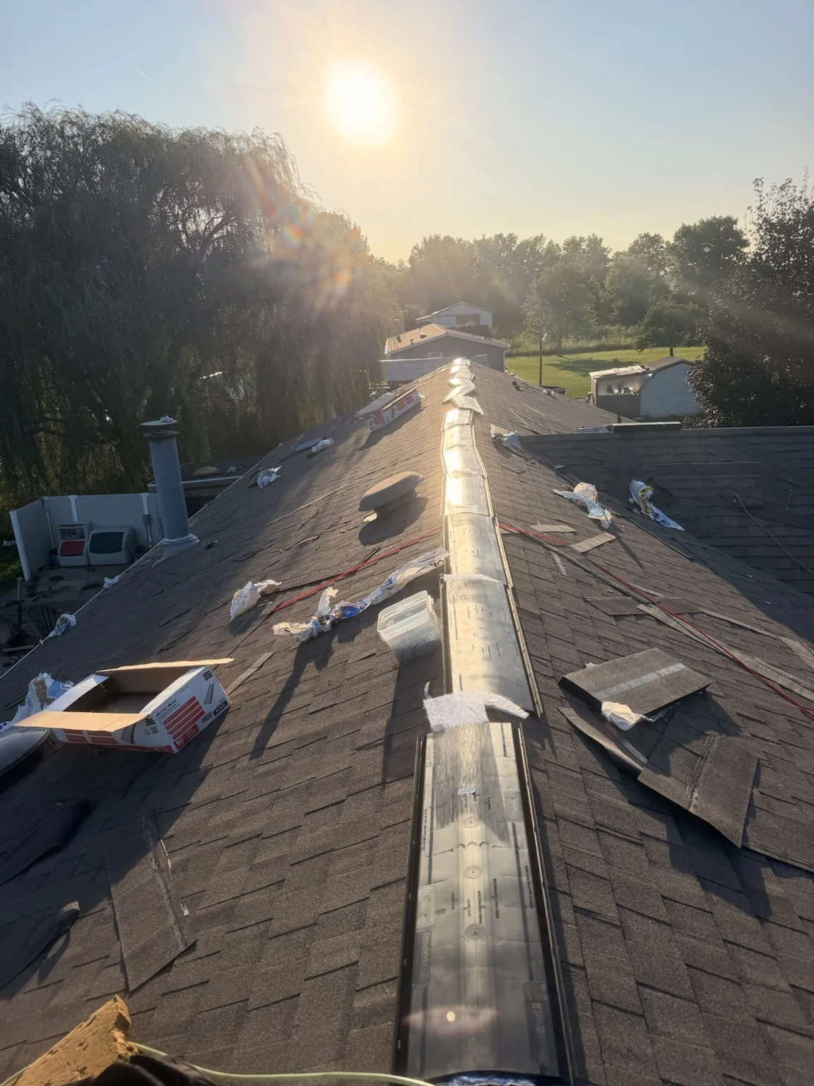 Roof underlayment installation in progress